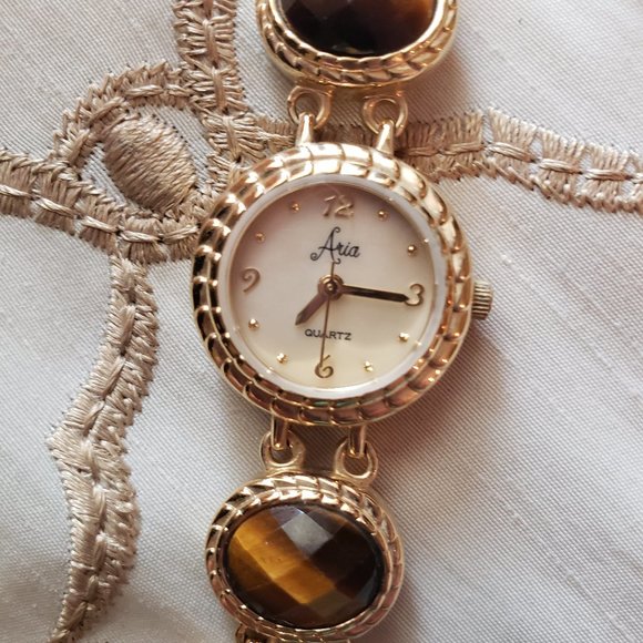 Aria Goldtone bracelet watch with tiger eye, smoky quartz and milky quartz gems - Picture 5 of 8